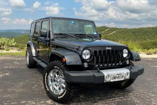 Photo 1 of 10 of 2014 Jeep Wrangler Unlimited Sahara
